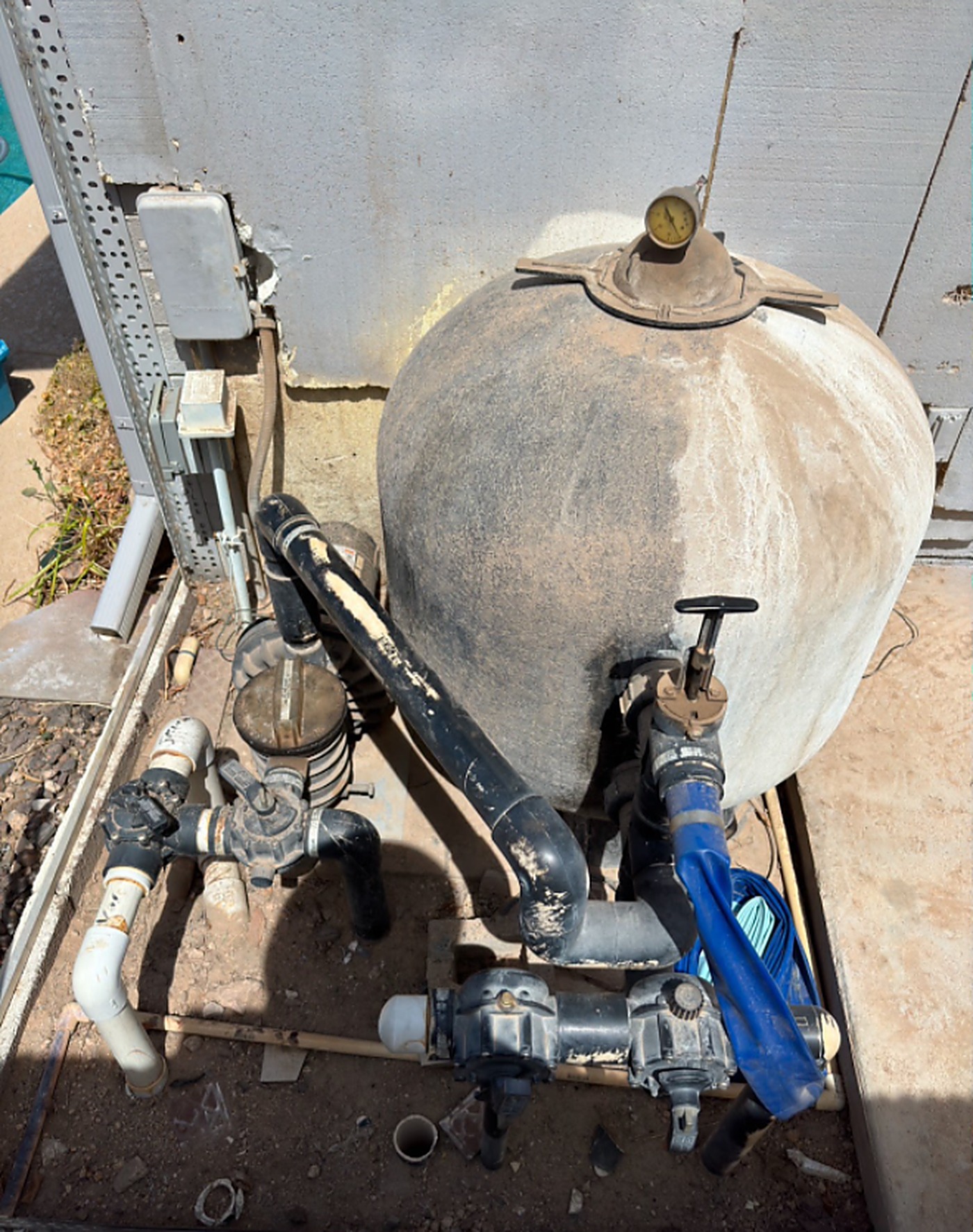 Before: an old, worn DE filter housing with corroded fittings