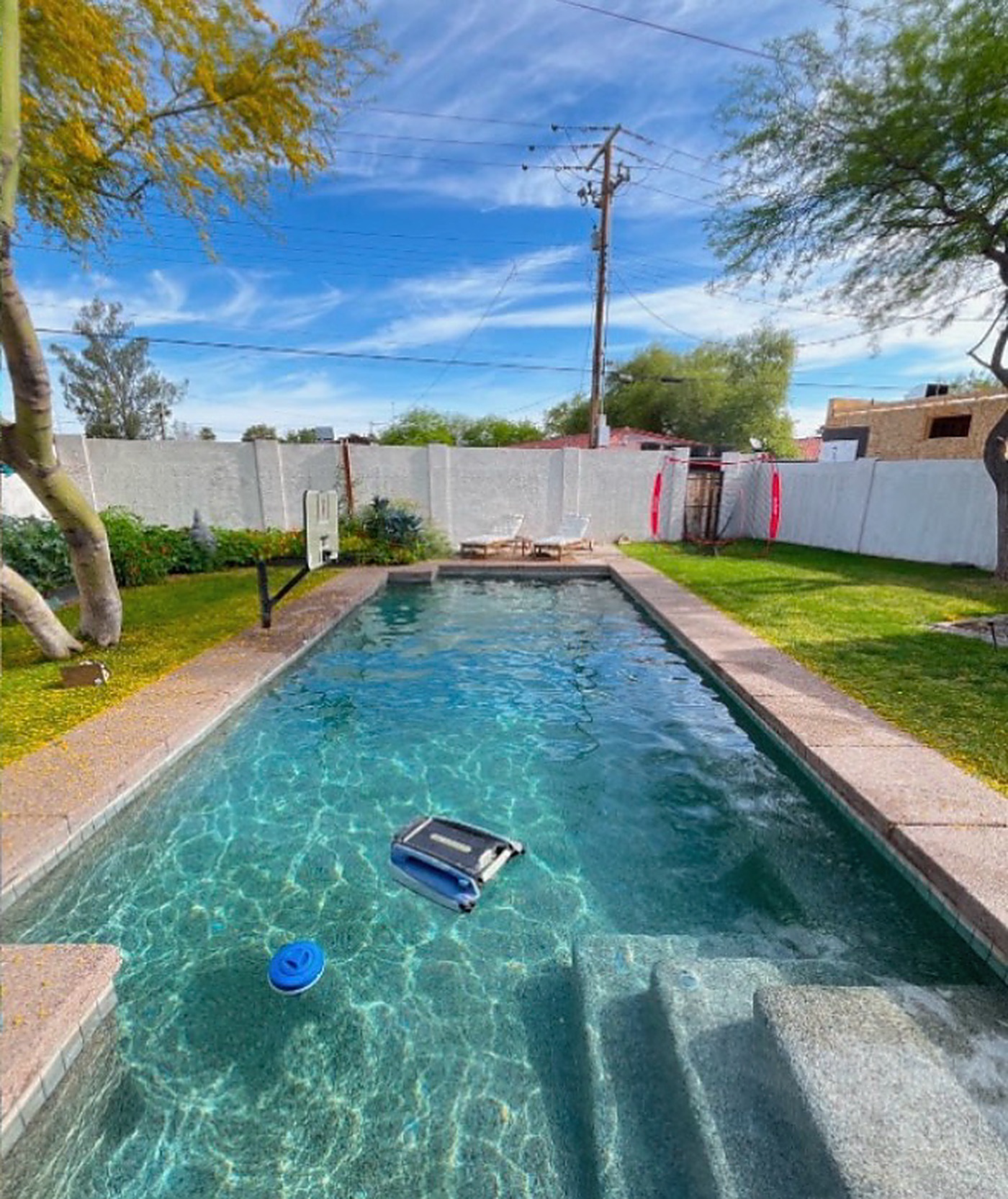 After: the same pool drained, refilled, and restored to crystal clear turquoise water